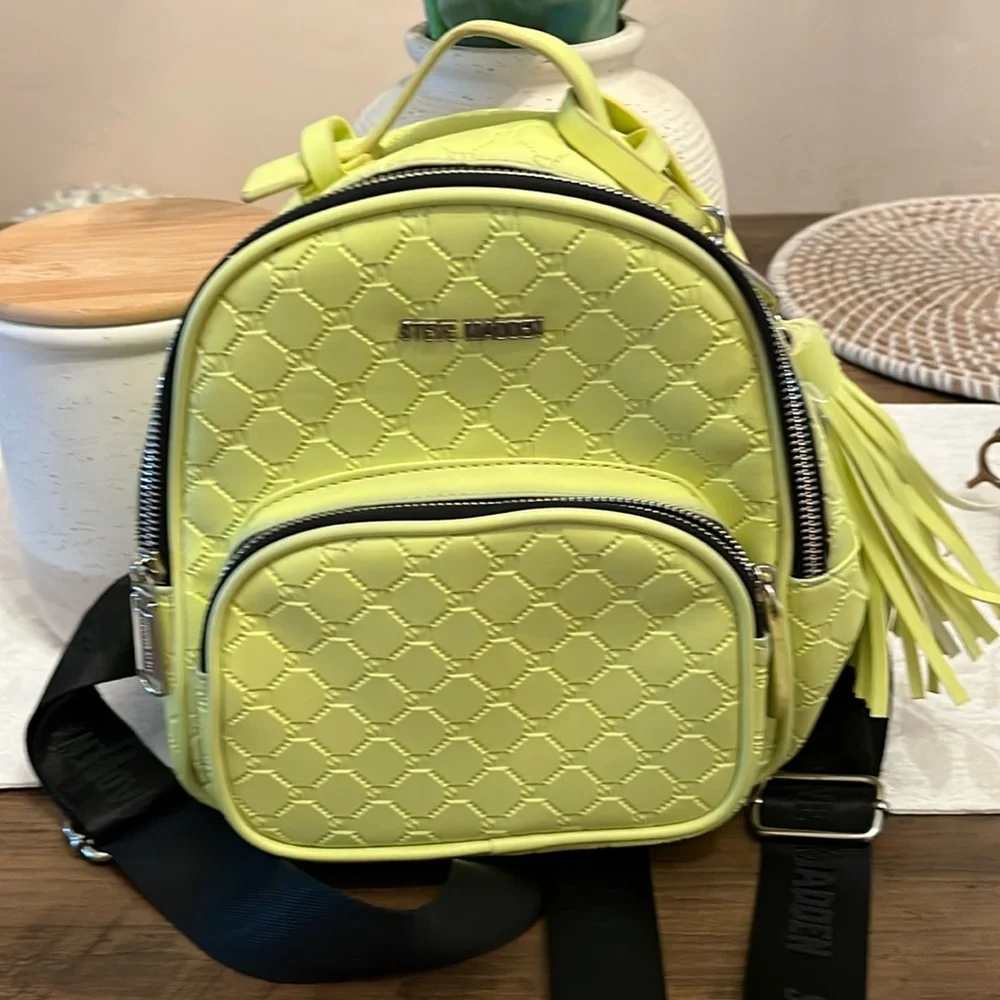 Steve madden neon backpack.